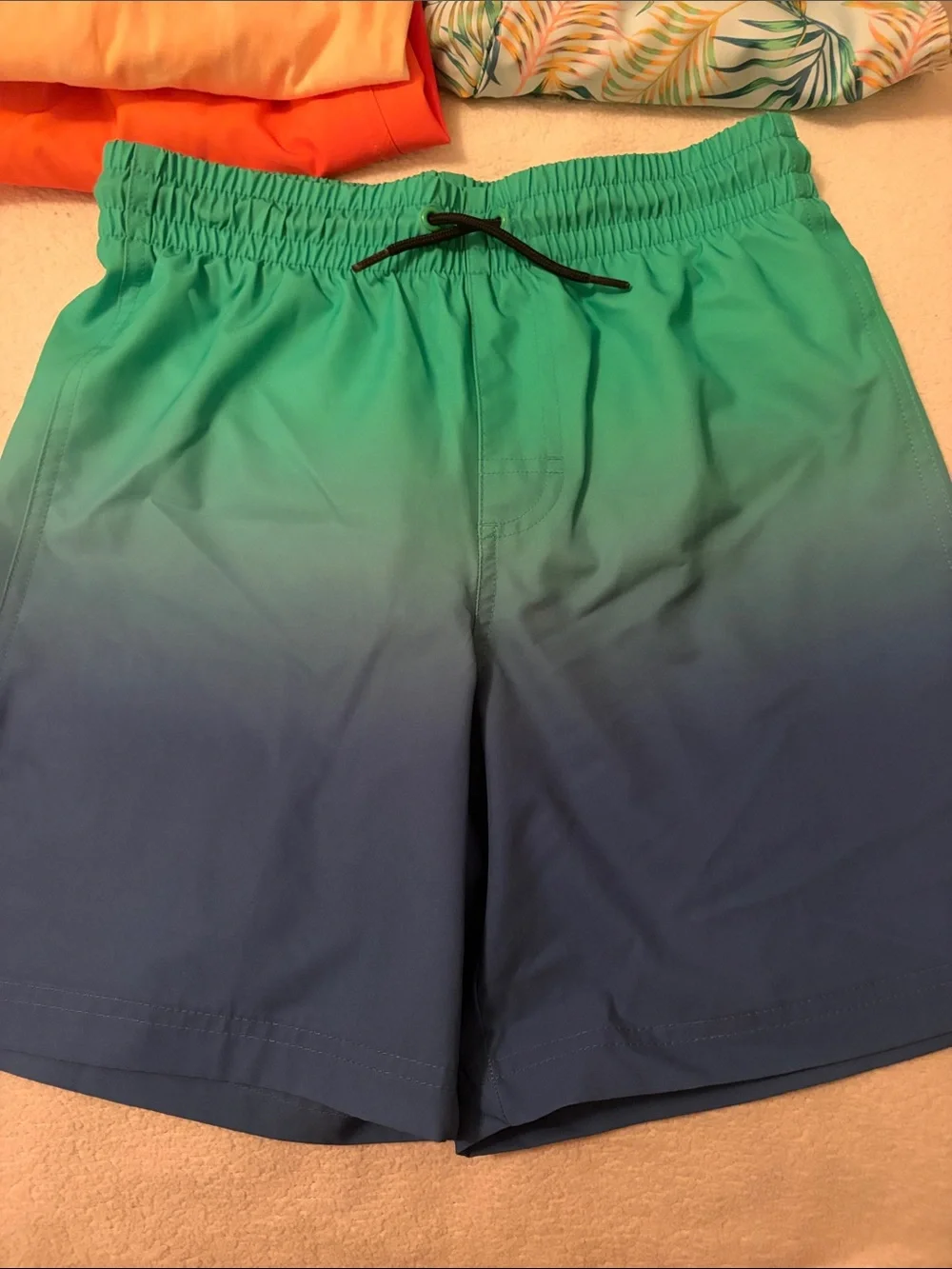 Lot of Swim trunks & T-Shits